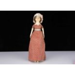 A fine and rare late 18th century English wooden doll,