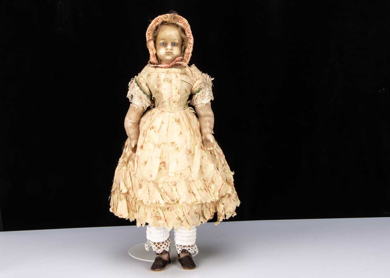 A large 19th century English poured wax child doll,