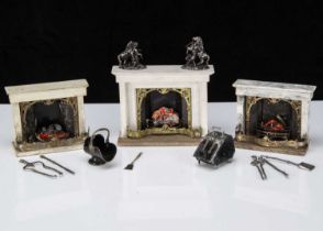 Three 19th wood and soft metal dolls’ house fireplace,