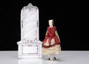 A rare bisque shoulder-head dolls’ house doll with moulded hat,