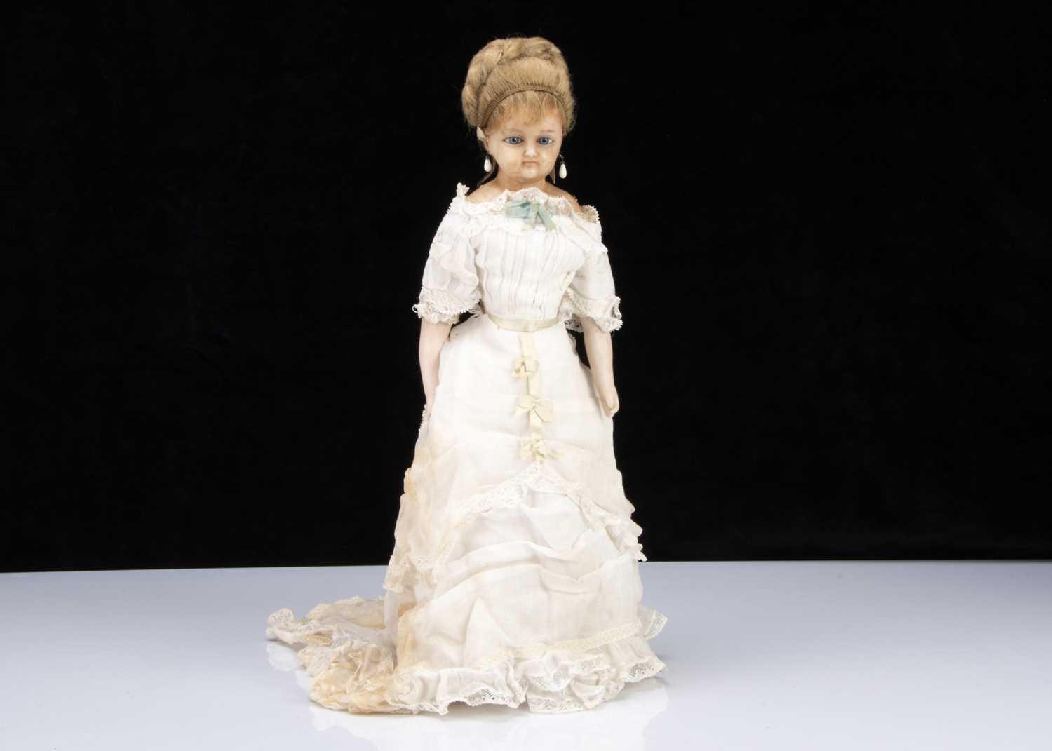 A late 19th century German wax over composition lady doll,