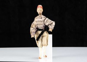 A German composition ‘Alien’ headed Turkish gentleman dolls’ house doll,