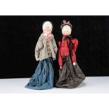 An unusal late 19th century German pegged wooden type hand puppet couple,