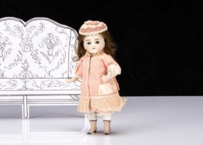 A small Kestner all-bisque Mignonette type doll,