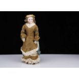 A late late 19th century French pressed bisque swivel-head fashionable doll on Gesland body,