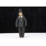 A rare 19th century English poured wax gentleman doll,