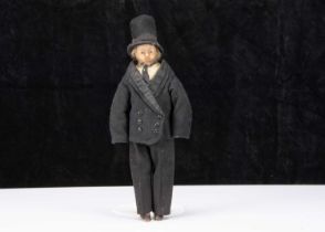 A rare 19th century English poured wax gentleman doll,