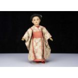 A Simon & Halbig Dep 1129 or 1199 Asian child doll,
