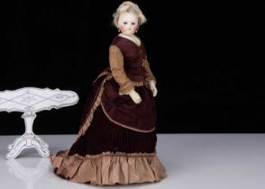 A rare 19th century Simonne fashionable doll with jointed wooden labelled body,