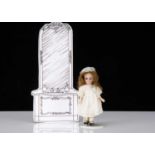 A German bisque headed dolls’ house doll,