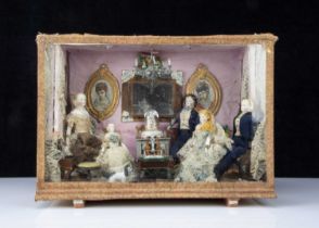 A second half of the 19th century room setting with bisque shoulder head dolls,