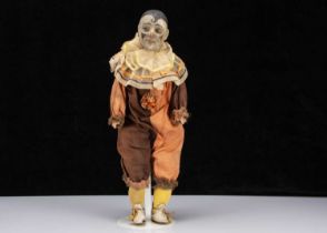 An unusal German composition head clown with rocking head musical mechanism 1920s,