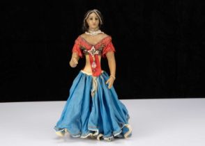 A rare late 19th century English poured wax Indian Princess doll,