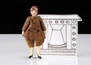 An all-bisque dolls’ house female pilot doll,