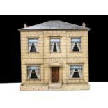 A mid 19th century English Toyman’s wooden dolls’ house,