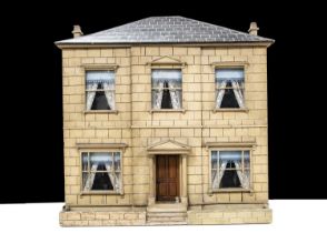 A mid 19th century English Toyman’s wooden dolls’ house,