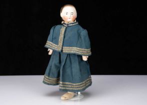 An unusual 19th century china headed girl doll,