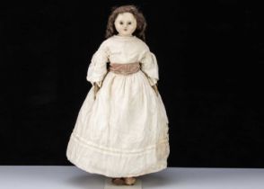 A large English 19th century wax over papier-mâché doll,