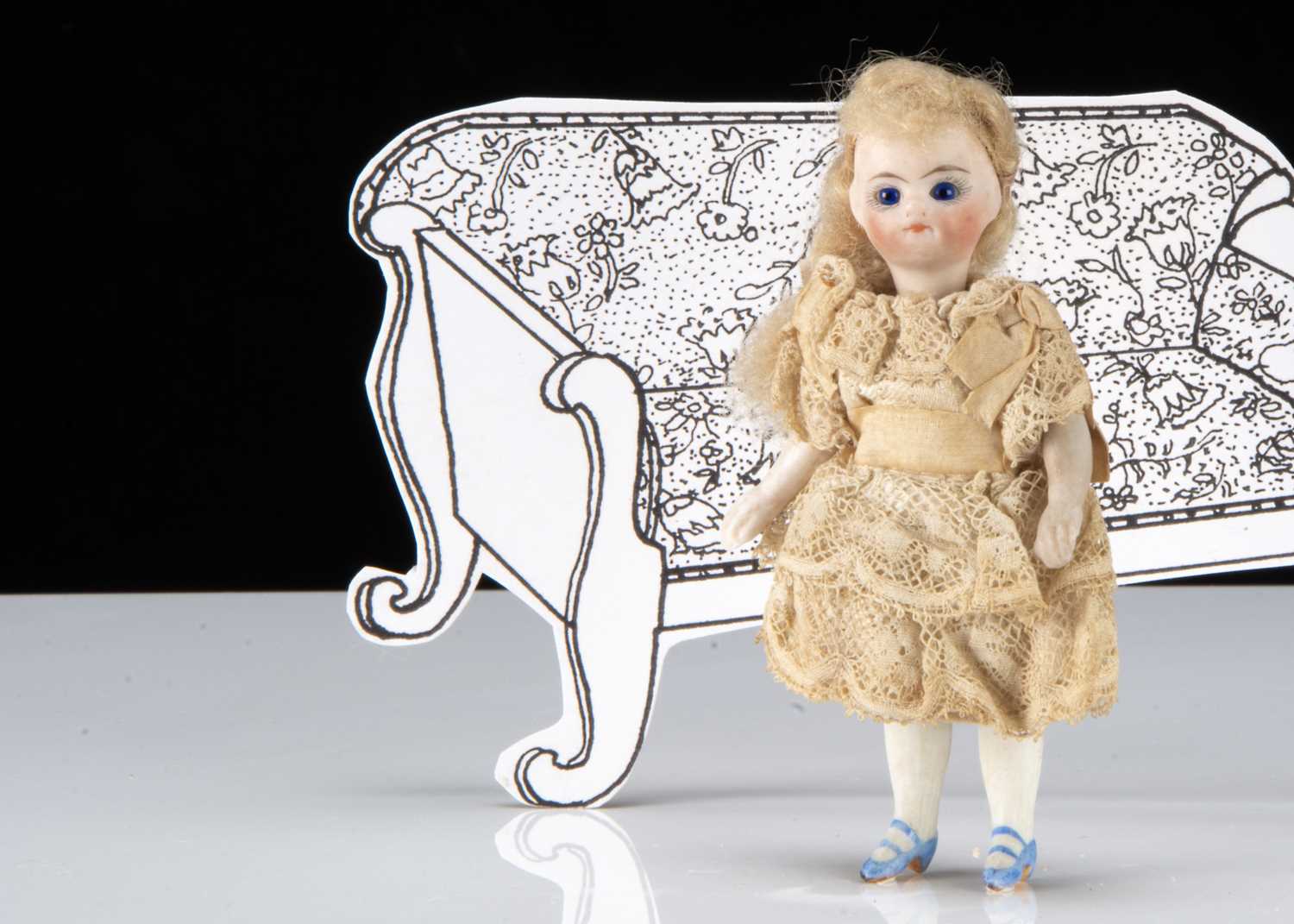 A French all-bisque swivel head dolls’ house doll,