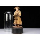 A reproduction automaton of of a girl with birdcage,