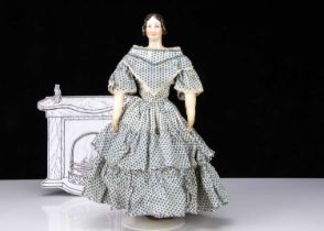 A rare mid 19th century KPM pink tinted china shoulder-head lady doll,