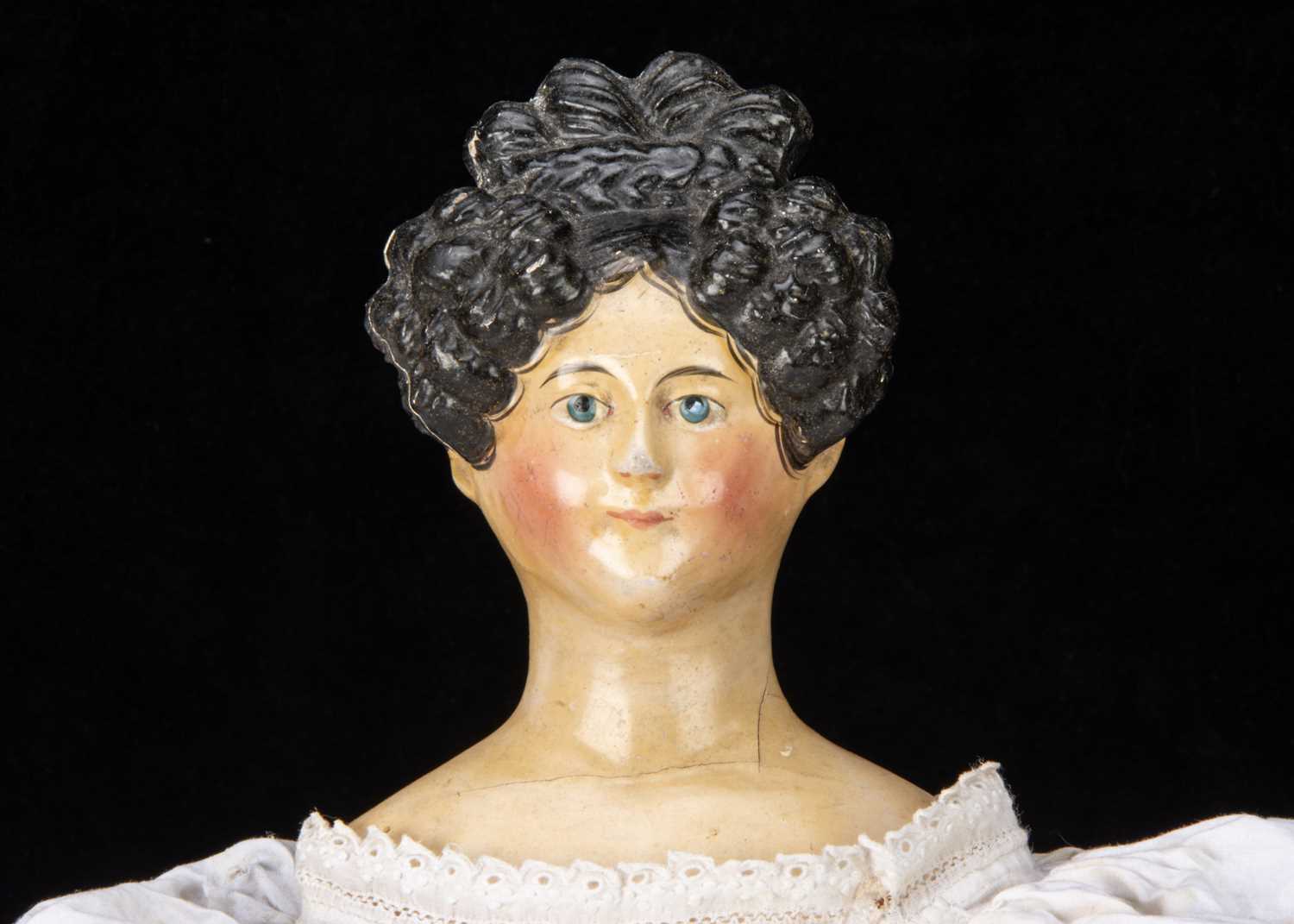 A mid 19th century German papier-mâché shoulder head doll with Apollo Knot hair, - Image 3 of 3