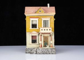 A small German wooden dolls’ house circa 1910,