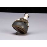 A French bisque headed Toupie spinning top circa 1900,