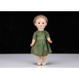 An Armand Marseille 323 googly eyed girl doll,