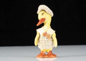 A Hertwig all-bisque dolls’ house duckling boy doll,