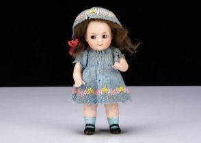 A small German all-bisque 401 googly eyed girl doll,