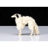 A German fur covered Borzoi dog suitable companion for a fashionable doll,