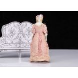 A rare 19th century small German bisque shoulder-head lady doll with moulded hat,