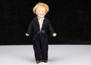 A rare German bisque headed character boy marked DEP TM 09,