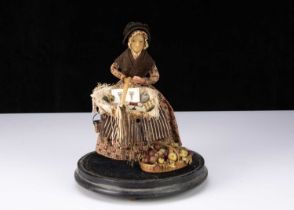 A rare 19th century beeswax pedlar doll,