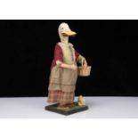 A German clockwork nodding lady duck 1920-30s,