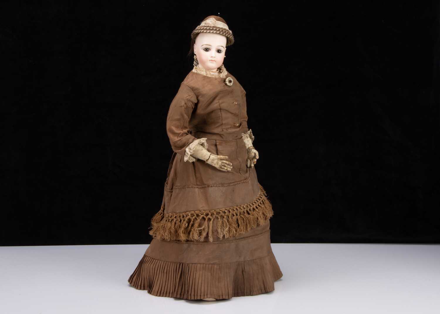 A large late 19th century Jumeau pressed bisque swivel-head fashionable doll,