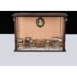 A set of early 20th century Viennese enamel and gilt metal dolls’ house furniture,