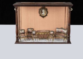 A set of early 20th century Viennese enamel and gilt metal dolls’ house furniture,