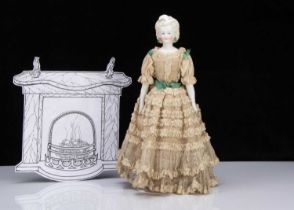 A German bisque shoulder head lady doll with elaborate hair,