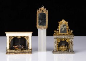 Two German soft-metal dolls’ house fireplaces,