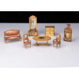 A late 19th century German satinwood dolls’ house set,