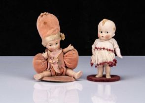 Two small German all-bisque comic children dolls,