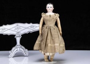 A late 19th century Petite French bisque shoulder-head doll,