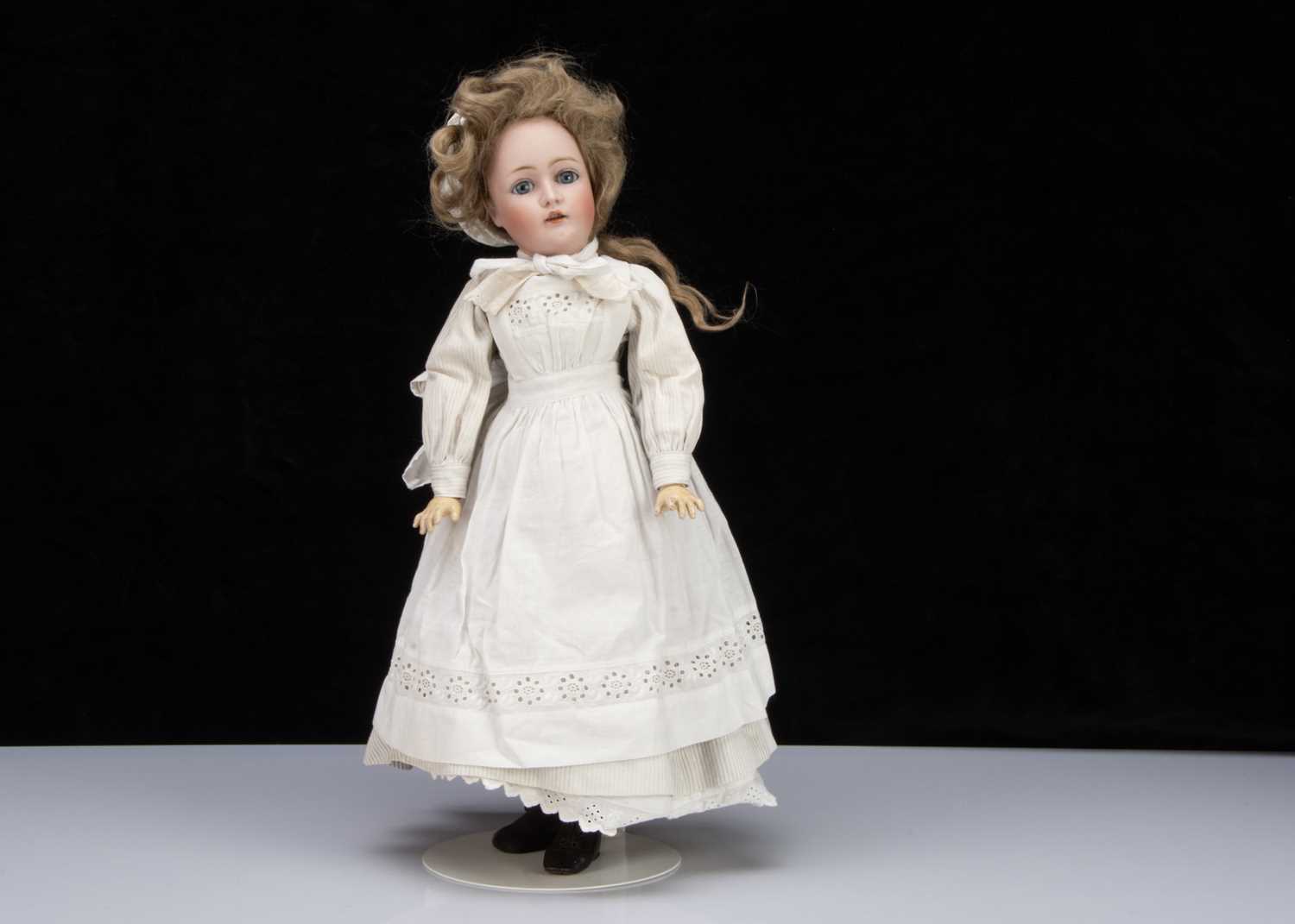 A rare Kestner 162 lady doll dressed as a cook,