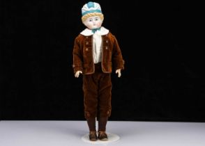 A rare large Alt, Beck & Gottschalck bisque shoulder head boy doll with moulded hat,
