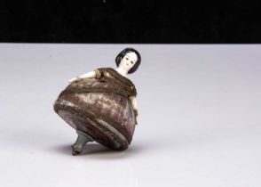 A French bisque headed Toupie spinning top circa 1900,