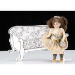 A Simon & Halbig bisque headed dolls’ house doll dressed as a flower fairy,