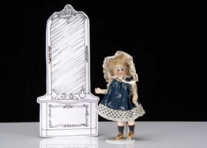 A German bisque headed dolls’ house doll,