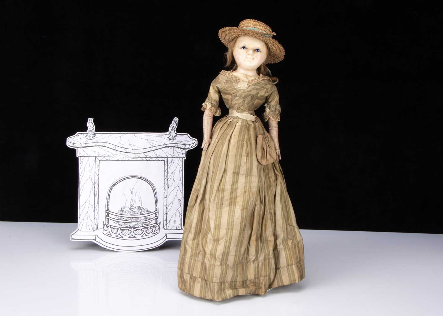 An early 19th century English wax over papier-mâché doll,